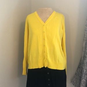 Bright yellow button up sweater
